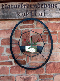Camino incluso: Wappen des Naturfreundehauses Kohlhof